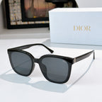 Sunglasses with black frame and gray-tinted lenses