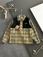 Long-sleeve jacket with black and beige plaid yoke, full-zip front, stand collar.