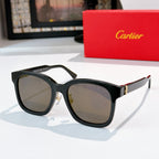 Black cat-eye sunglasses with gray lenses and gold hinge detail