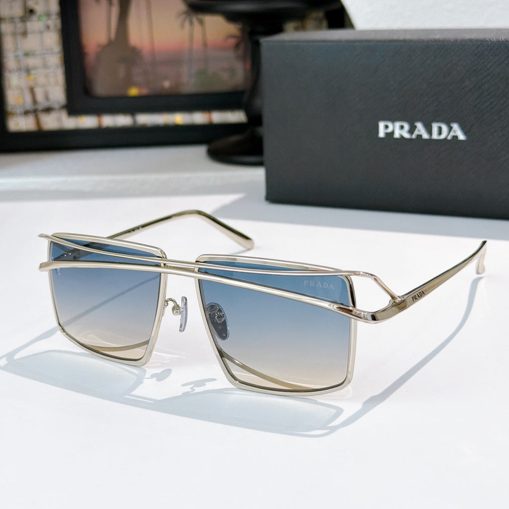 Gold metal sunglasses with light blue tinted rectangular lenses