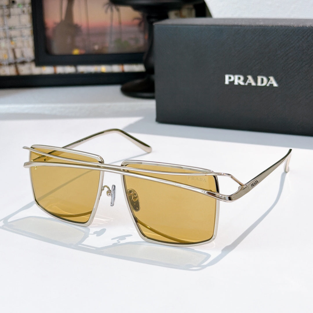Gold metal sunglasses with yellow tinted rectangular lenses