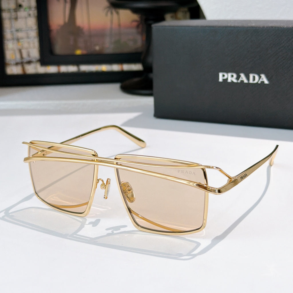 Gold metal sunglasses with light brown tinted rectangular lenses