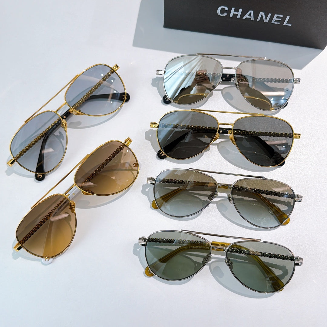Assorted aviator sunglasses with mixed frames and colored mirrored lenses
