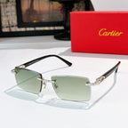Square eyeglasses with green lens tint and light frames, gold-tone details