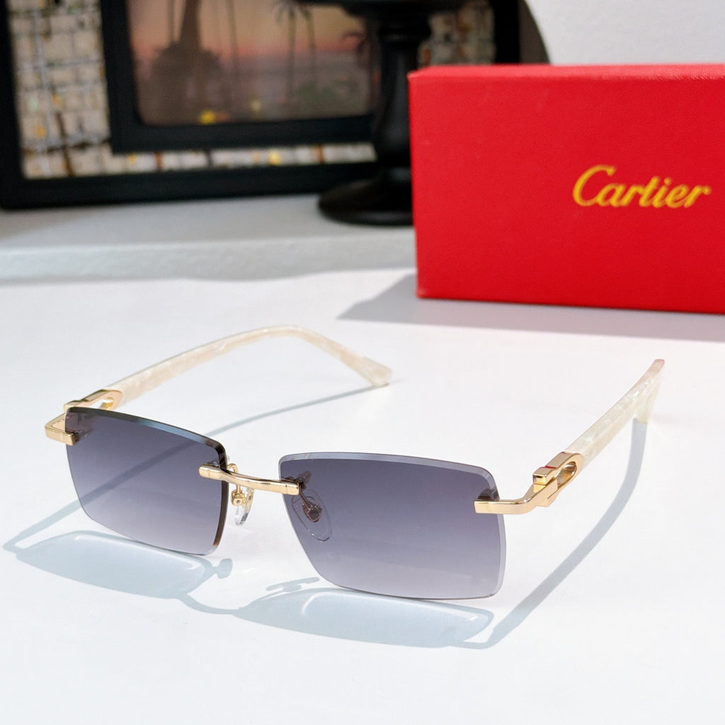 Square eyeglasses with light frames and gold-tone accents, dark blue lens tint