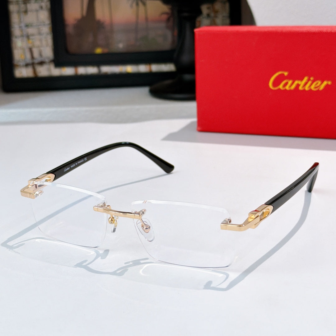Rectangular eyeglasses with black frames and gold-tone details, clear lenses