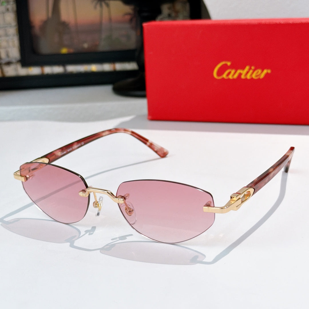 Cartier sunglasses with reddish-brown frames, pink tinted lenses, and gold metal accents