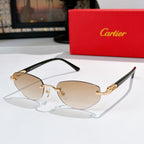 Cartier sunglasses with black frames and light tan lenses with gold metal details