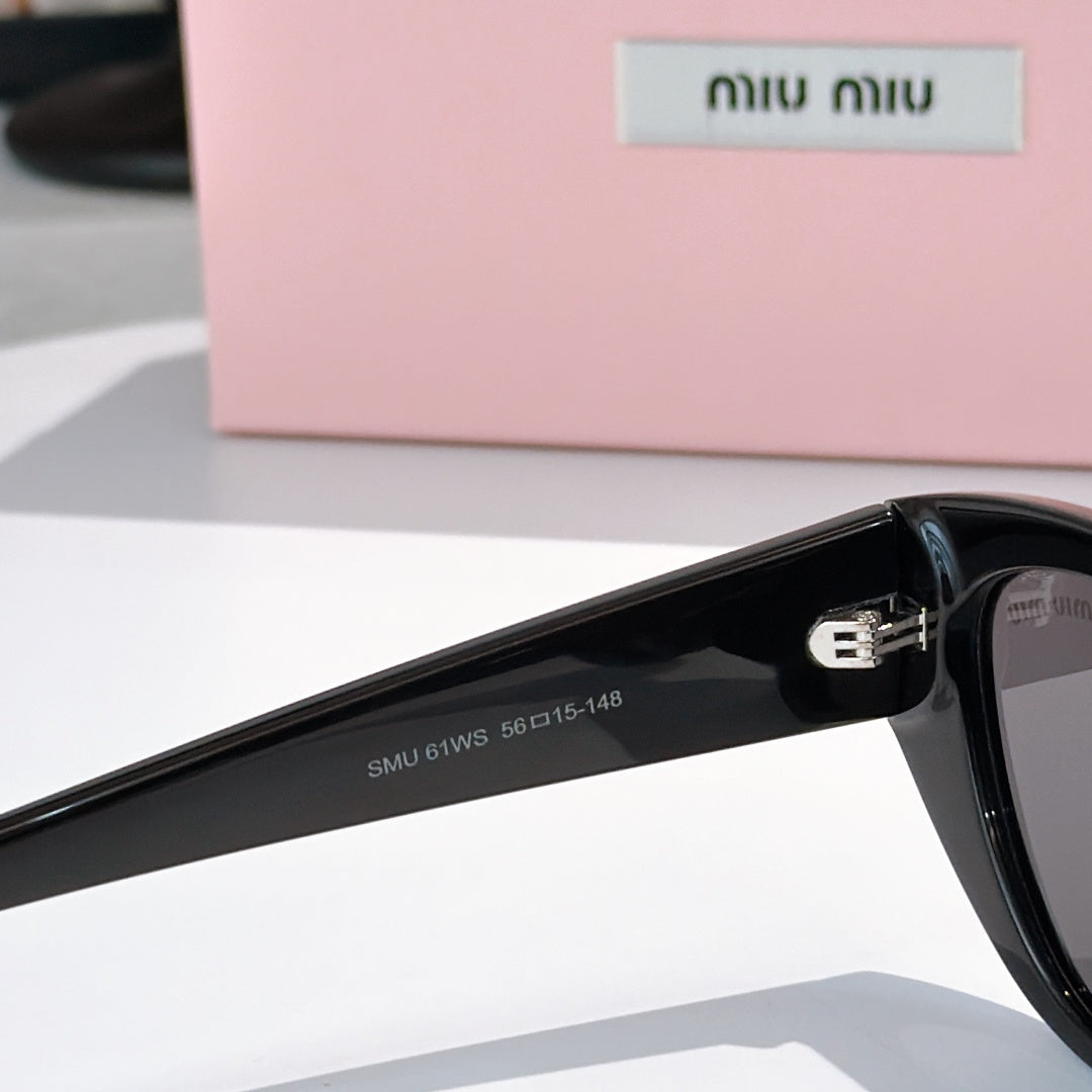 MiuMiu sunglasses with black temple bar and printed logo