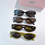 MiuMiu sunglasses set with black, brown, olive, and yellow frames and tinted lenses