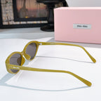 MiuMiu sunglasses side view with yellow frames and dark lenses