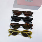 MiuMiu sunglasses assortment with black, dark tortoiseshell, amber, and yellow frames