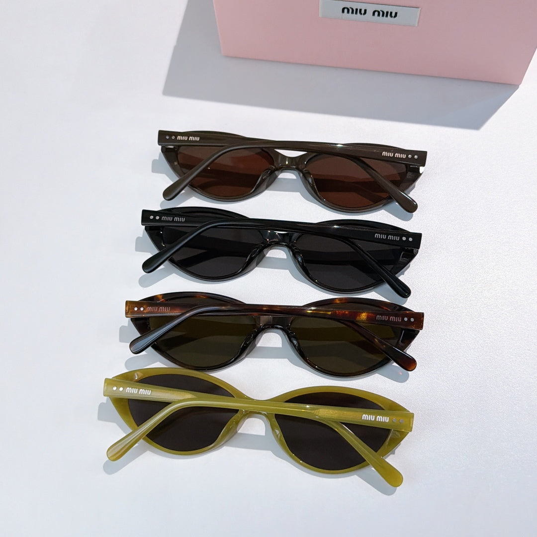 MiuMiu sunglasses assortment with black, dark tortoiseshell, amber, and yellow frames