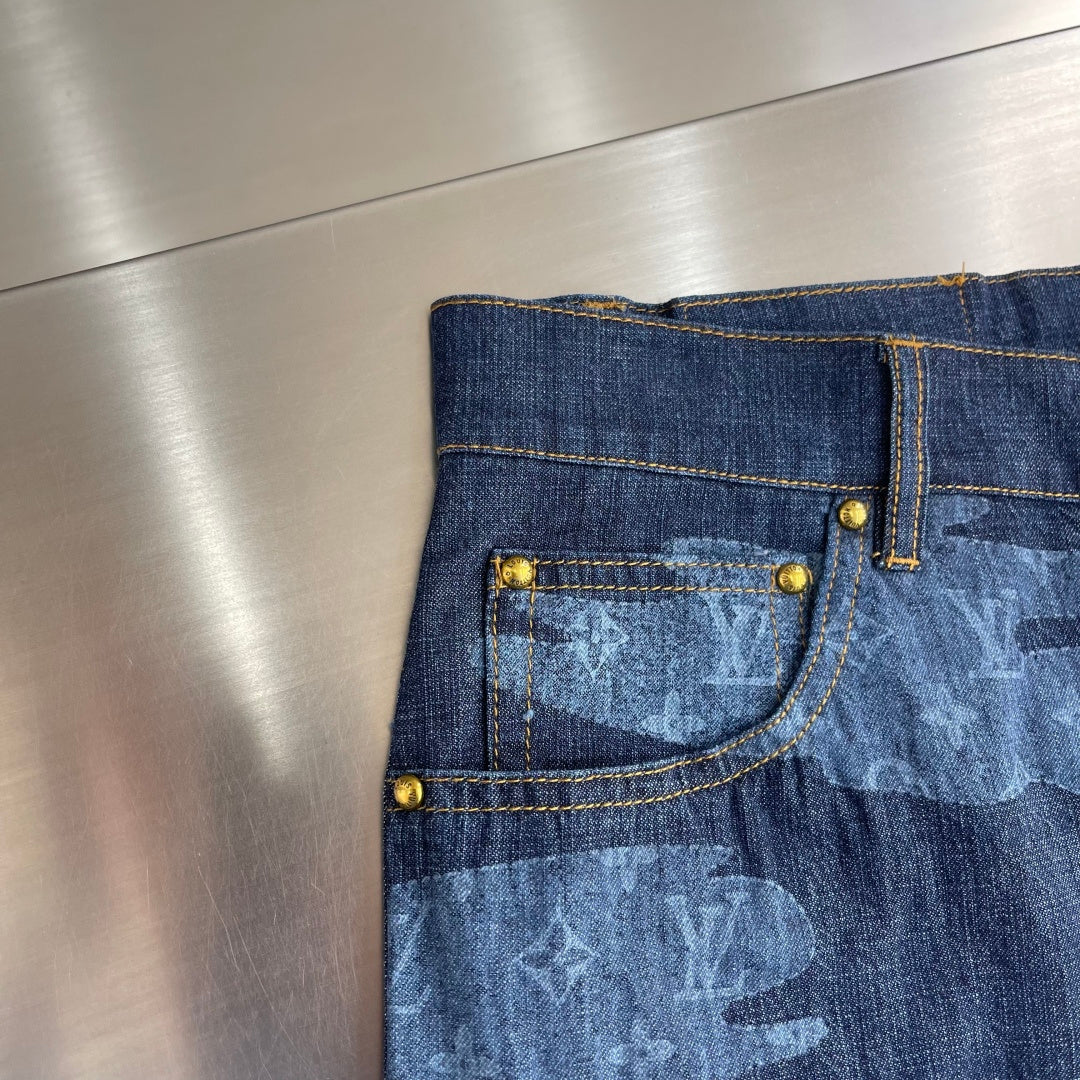 Louis Vuitton dark blue denim shorts with gold-tone buttons and light blue patterned back pocket