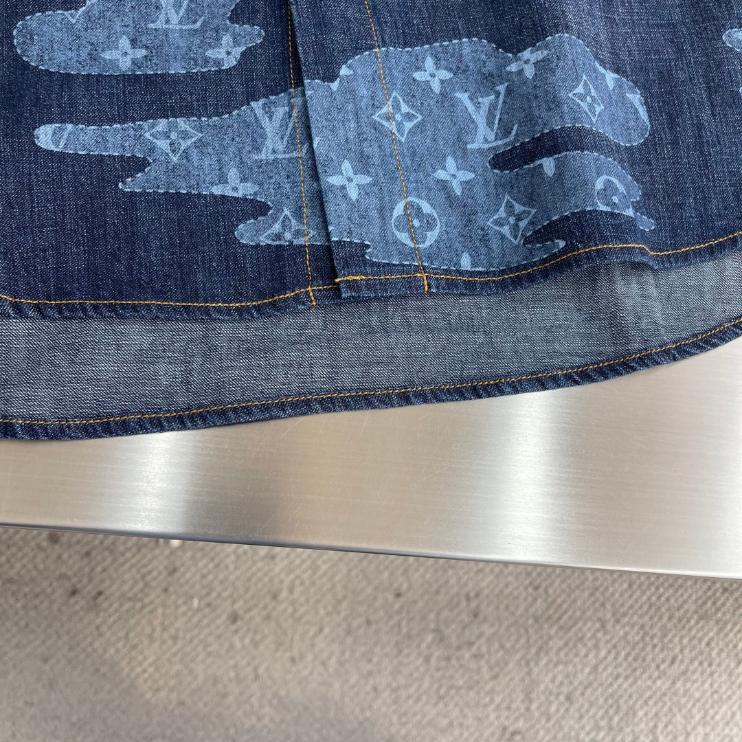 Louis Vuitton denim shirt hem, blue monogram print and yellow-stitched edge