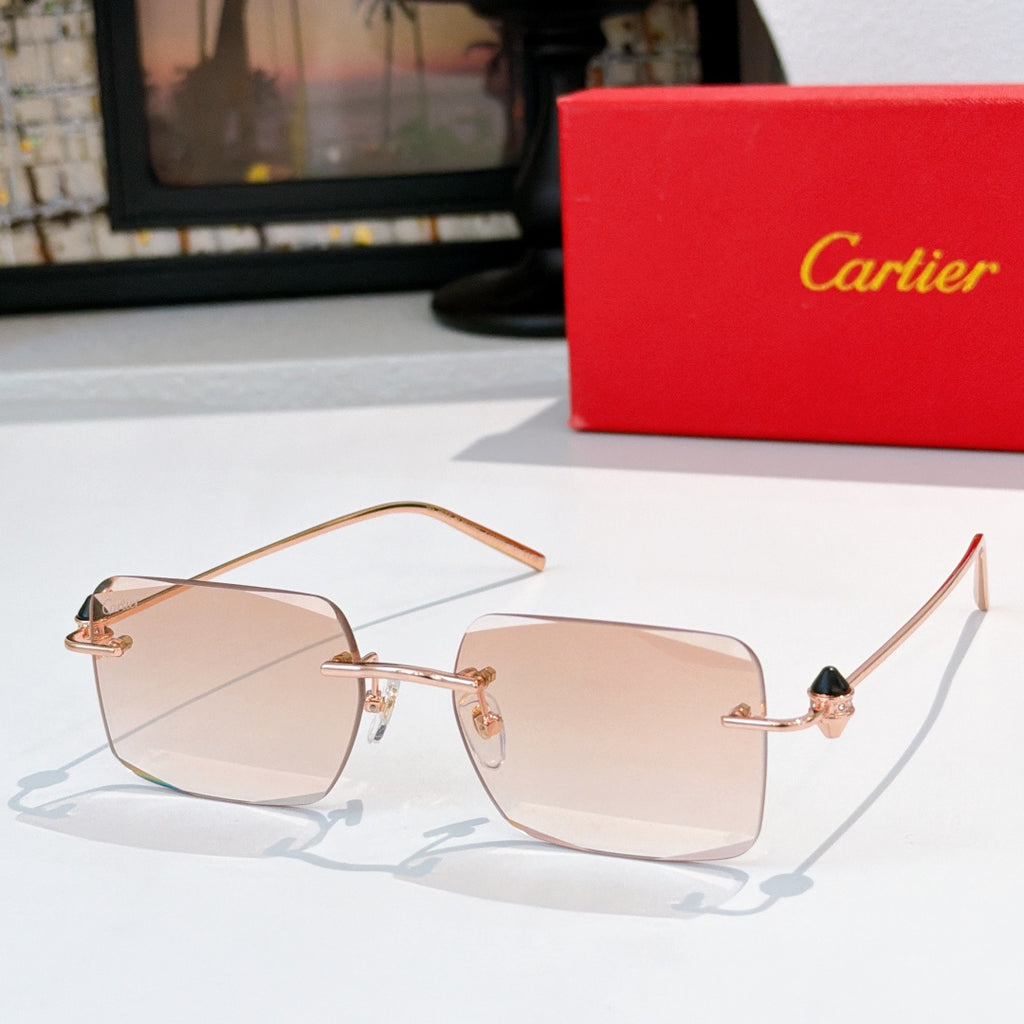 Cartier glasses with pink tinted lenses and gold metal frame
