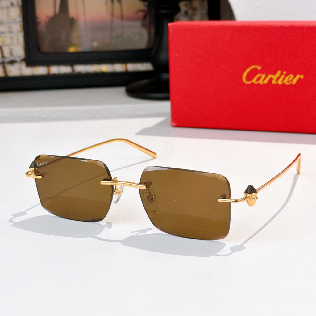 Cartier glasses with brown tinted lenses and gold metal frame