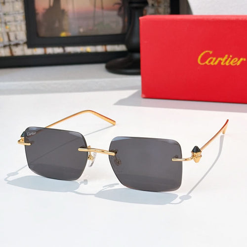 Cartier glasses with dark gray tinted lenses and gold metal frame