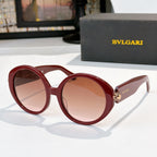 Burgundy sunglasses with rose tinted lenses, BVLGARI logo on temple arms