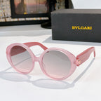 Light pink sunglasses with rose tinted lenses, BVLGARI logo on temple