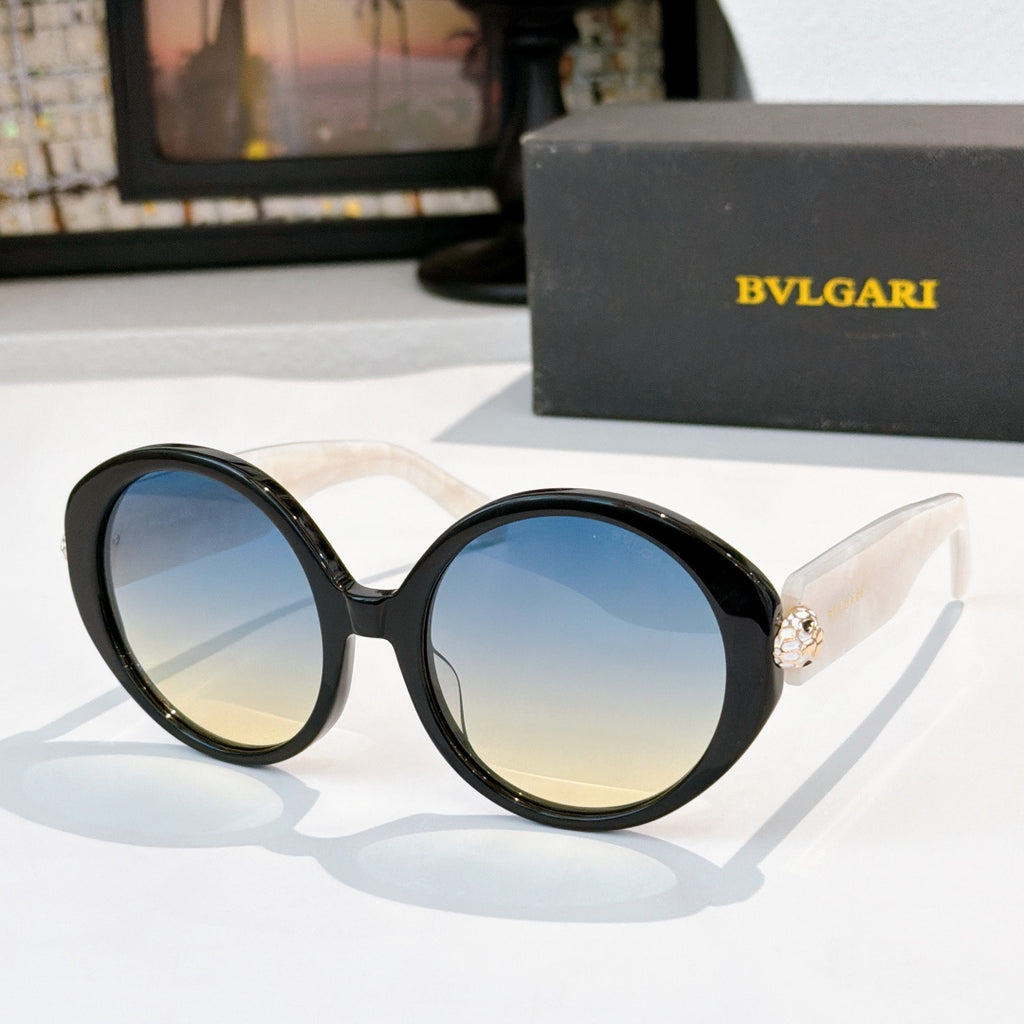 Black sunglasses with gradient blue lenses, BVLGARI logo on temple arms