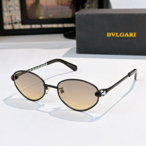 Round sunglasses with light lenses, black temples, and thin metal frame