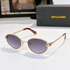Gold-rim round sunglasses with purple-tinted lenses and tortoise temple tips