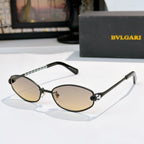Sunglasses with black frame, metallic arms, and beige tinted lenses