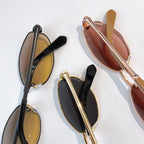 Sunglasses set with mixed frames and tinted lenses in amber, black, and rose tones