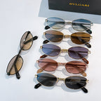 Sunglasses assortment with multiple frames and tinted lenses, stacked view