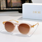 Round sunglasses with light rose frames and brown tinted lenses