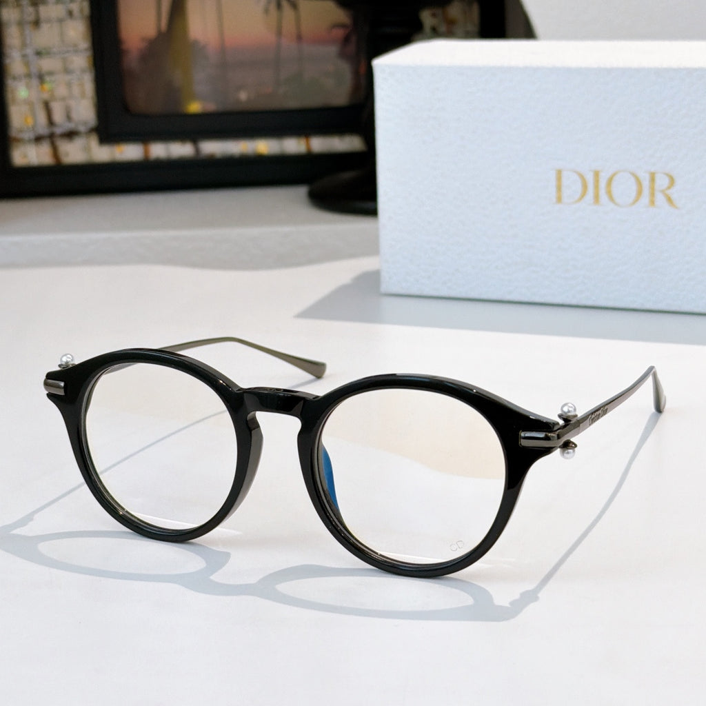 Round eyeglasses with black frames and clear lenses