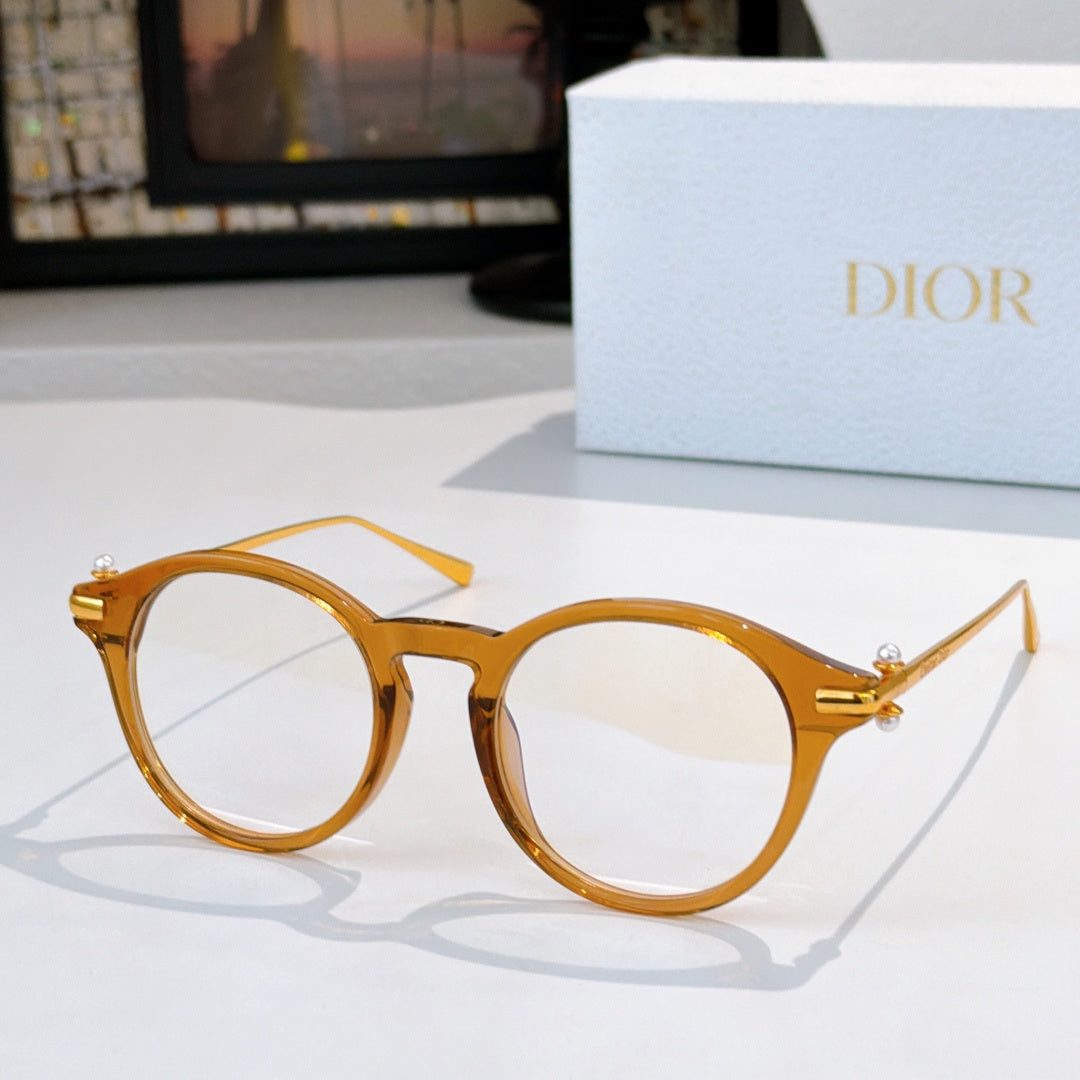 Round eyeglasses with amber frames and clear lenses