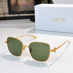 Gold-tone sunglasses with dark green mirrored lenses and slim temples