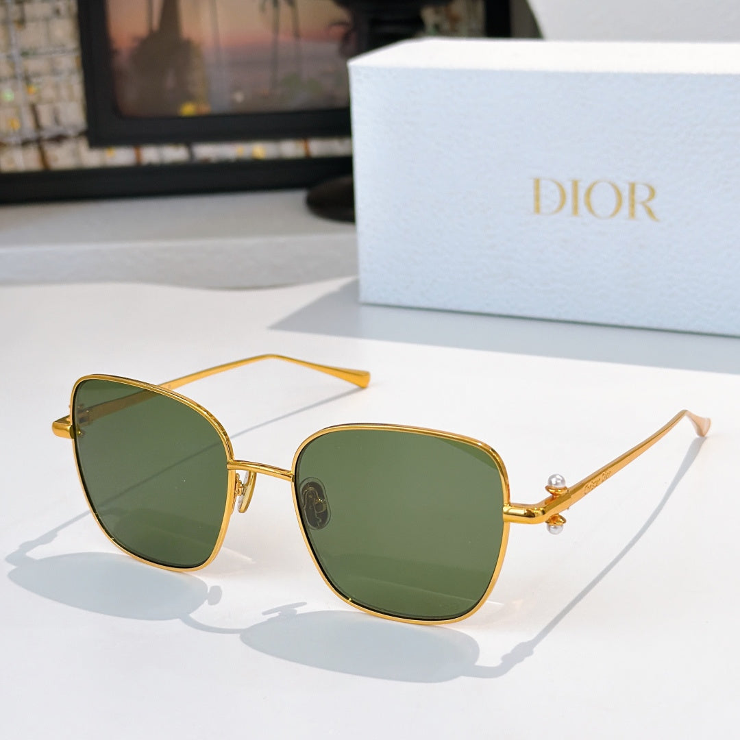 Gold-tone sunglasses with dark green mirrored lenses and slim temples