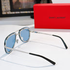 Dior sunglasses with light blue tinted lenses and silver frame