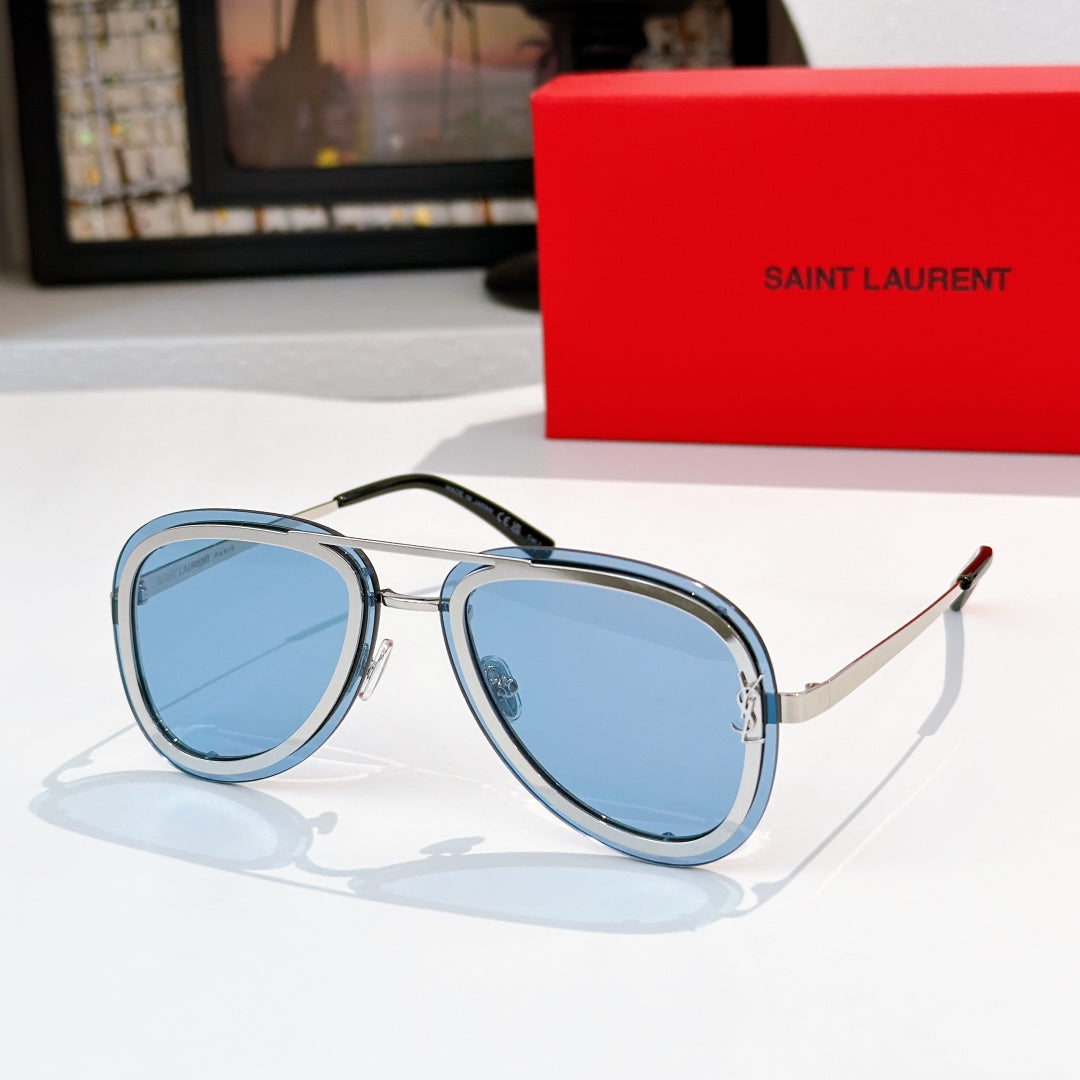 Dior sunglasses with light blue lenses and blue-tinted frames
