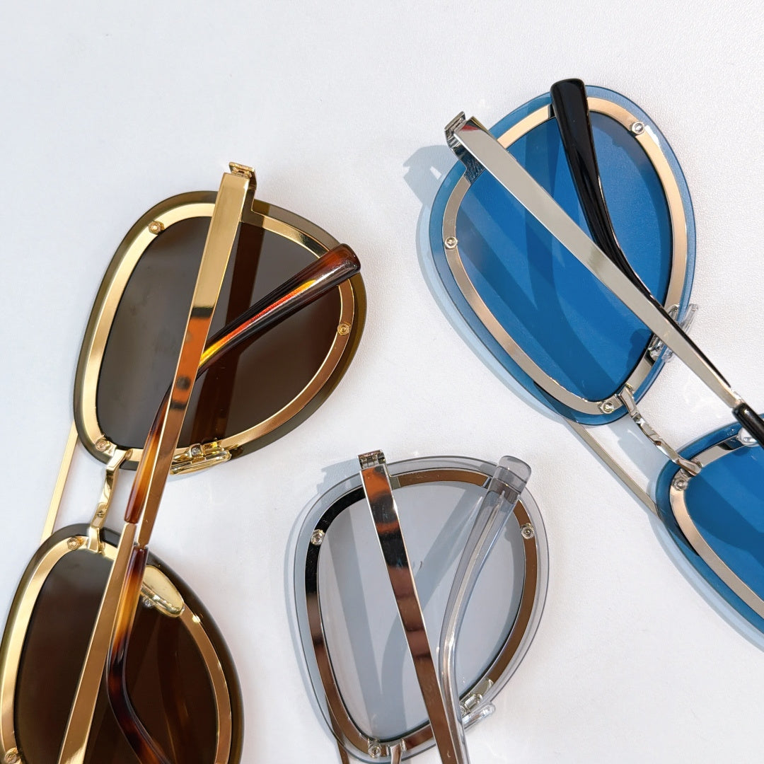 Dior sunglasses assortment with gold, brown, and blue frames