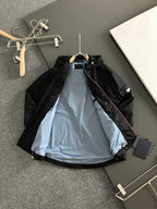 Prada black hooded jacket with light blue interior lining and zipper