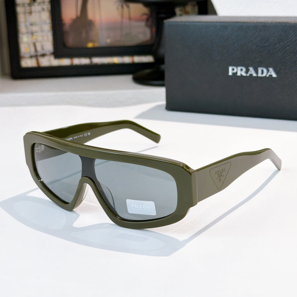 Prada sunglasses in olive green with tinted lenses, angular full-rim frame