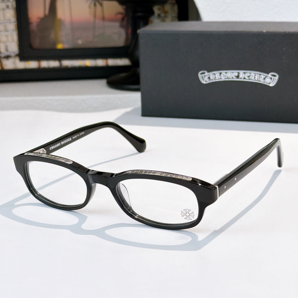 Chrome-finish glasses with black frames and oval clear lenses