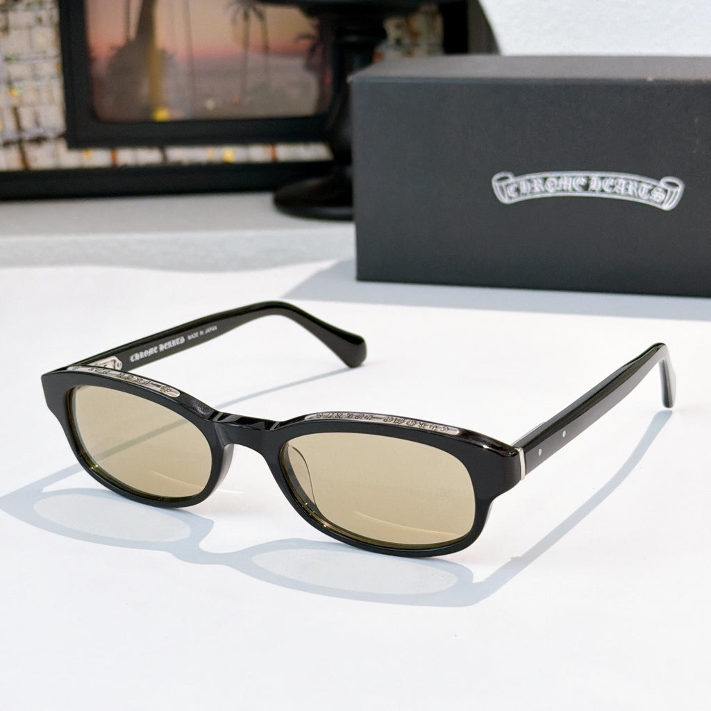 Chrome-finish sunglasses with black frames and oval tinted lenses