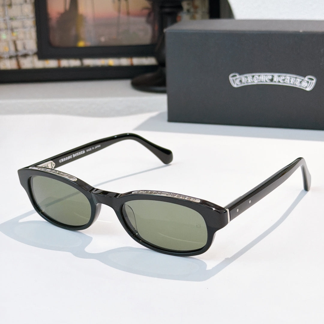 Chrome-finish sunglasses with black frames and oval dark lenses