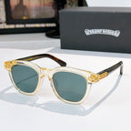 Chrome sunglasses with gold temples and teal-tinted lenses