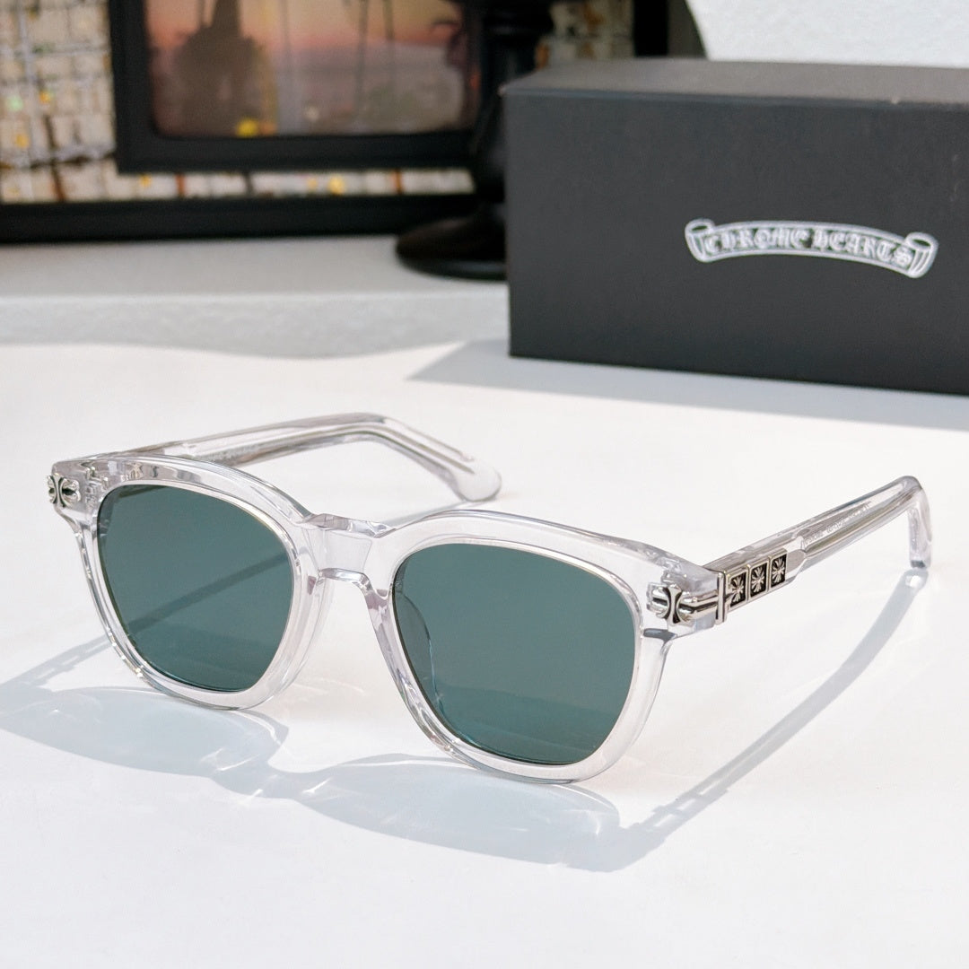 Chrome sunglasses with clear frame and teal-tinted lenses