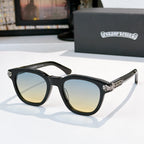 Chrome sunglasses with black frame and light amber-tinted lenses