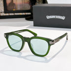 Green acetate glasses with clear lenses and silver temple logo detail