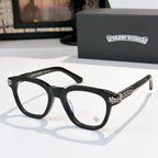 Black acetate glasses with clear lenses and silver temple emblem detail