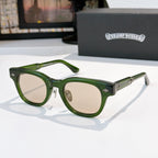 Oval sunglasses with green frame and light beige tinted lenses, metal temples and arms.
