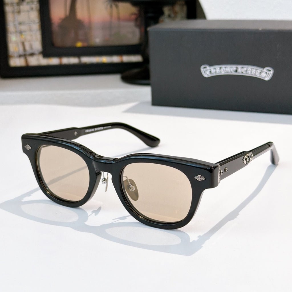Glasses with black frames and light-tinted lenses, metal temples